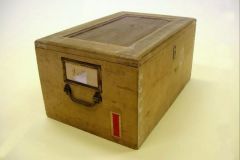 Wooden Box. ex. Num. 34;  31 x 24 x 47 cm, 19th century  Unfinished tint wood, mounting,  handle and lock  Box for storing Czech Crown documents  Provincial Archive in Prague.  Donated by National Archive in Prague, I. Dep., V/2007